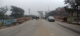 Agra Metro Hariparvat bridge widening issue MG Road traffic jam UPMRC railway PWD negligence