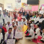 SN Medical College Agra World Cancer Day awareness rally and street play students holding posters