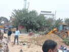 Anti encroachment drive in Sector 11 by Awas Vikas Parishad, JCB machine destroying illegal construction, Editor in Chief Thakur Pawan Singh Taj News