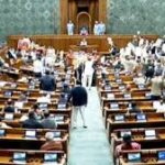 Lok Sabha uproar PM Modi address postponed opposition female MPs protest near treasury benches Manoj Tiwari Rahul Gandhi reaction