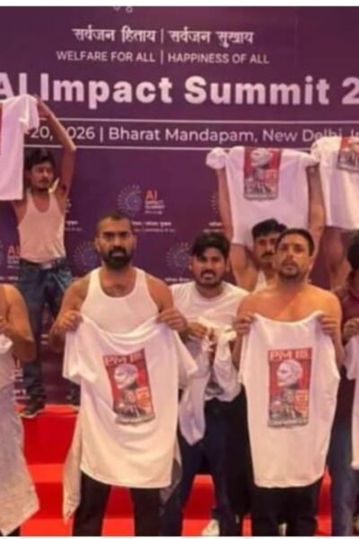 Rajendra Sharma political satire article on AI Summit protests and Galgotias University robot dog