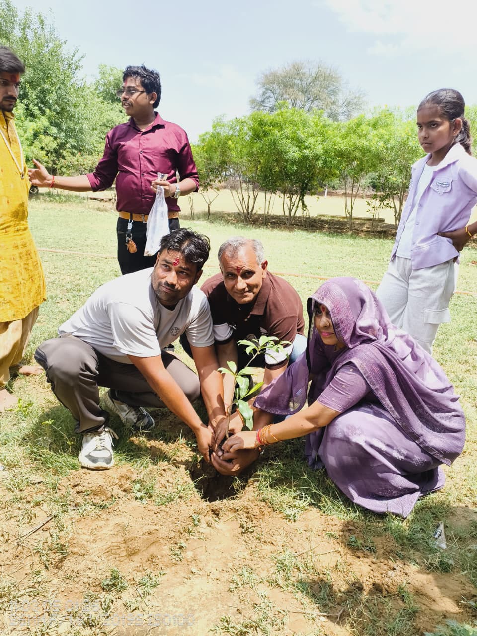 हवन में आहुति देते खिलाड़ी और प्रशिक्षक