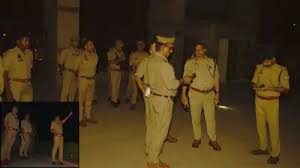 Agra Police and forensic experts inspecting the broken lock mechanism of the zip line