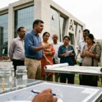 सुप्रीम कोर्ट की सख्ती के बाद यमुना पुनर्जीवन को नई उम्मीद, रिवर कनेक्ट अभियान ने फैसले का किया स्वागत Environmental activists demonstrating for river restoration and clean water initiatives in Agra near administrative desk setups