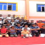 मथुरा में आगरा के बैडमिंटन खिलाड़ियों का जलवा: राज्य स्तरीय प्रतियोगिता में वंश खन्ना, वेदांश, नैतिक और शौर्य ने जीते पदक, जिले का नाम किया रोशन Professional youth badminton athletes celebrating victory setup during a sports event championship review