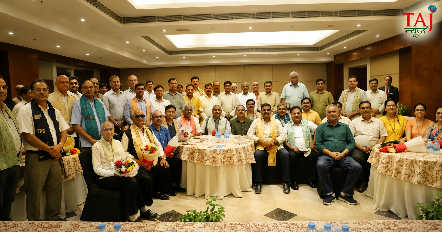 Union Ministers Dr Virendra Kumar and SP Singh Baghel greeting traders and lawyers panel on stage at PL Palace Agra review setup.