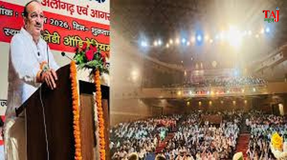 State minister addressing public seminar audience from a podium inside an educational auditorium setup review