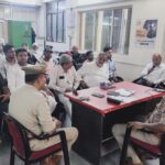 Local aman committee peace meeting session involving authorities and social leaders at Mantola police station in Agra review setup.