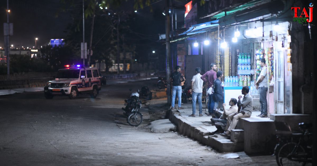 Security camera logs capturing speed bike riders suspects during street chain snatching on service road perimeter in Agra