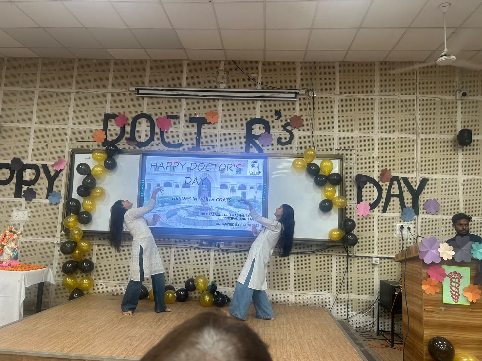 Principal Dr Prashant Gupta and senior faculty members lighting the lamp during National Doctors Day event at SNMC Agra