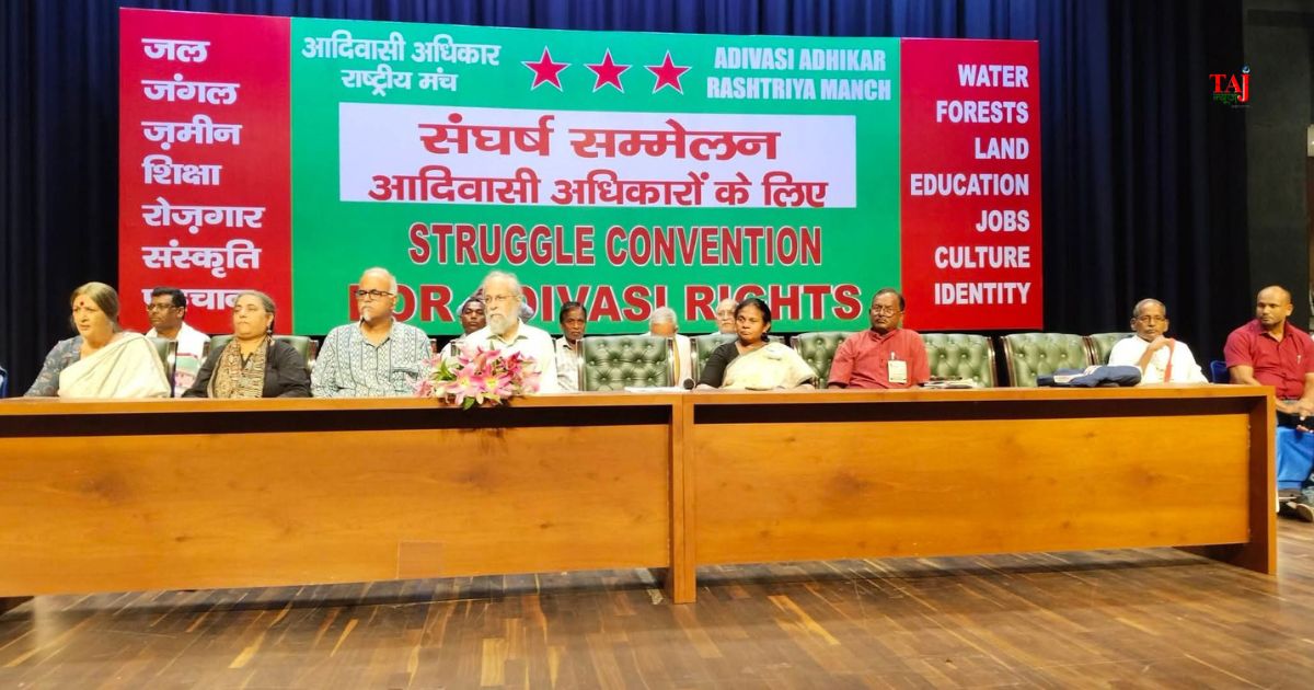 National tribal convention rally in New Delhi protesting corporate land grabs Forest Rights Act violations and bureaucratic assault on Adivasi rights 2026